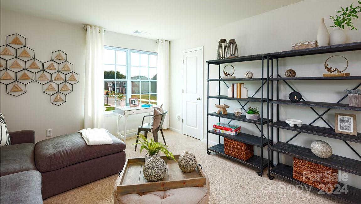 186 Wheatfield Road Fletcher, NC 28732 - Photo 22 of 25 a living room with furniture a rug and a window
