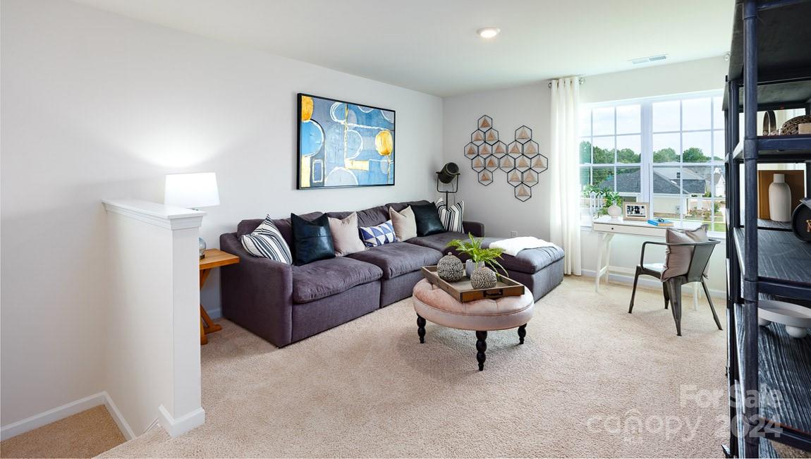186 Wheatfield Road Fletcher, NC 28732 - Photo 24 of 25 a living room with furniture and a large window