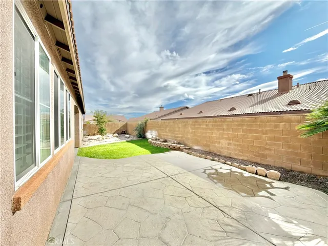 a view of a balcony with an outdoor space