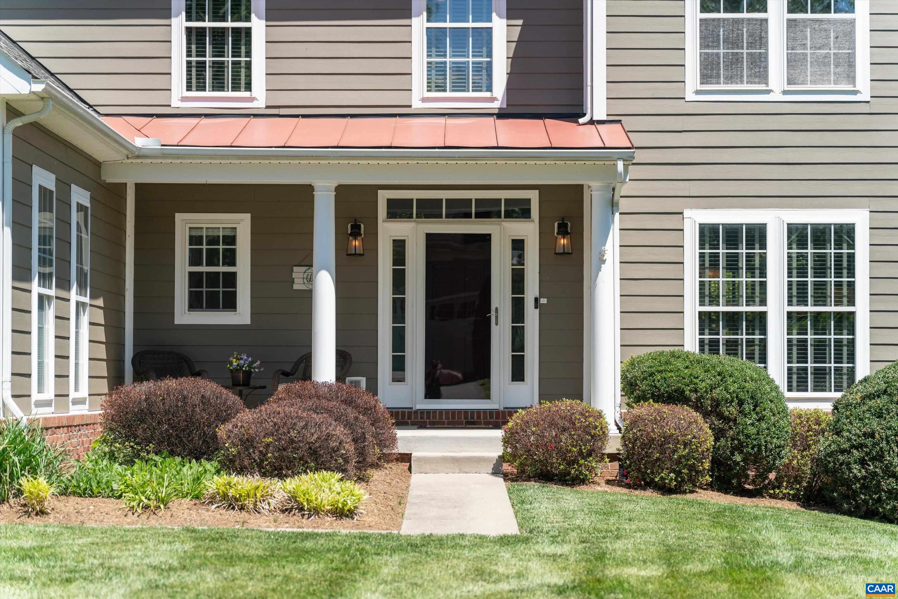 5366 Park Road Crozet, VA 22932 - Photo 12 of 61 a view of a house with potted plants and a yard