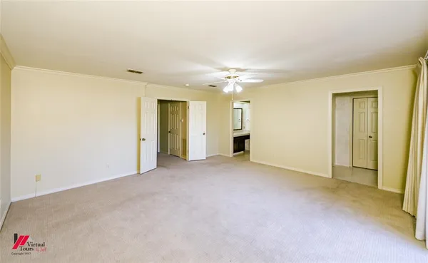 an empty room with a bathroom