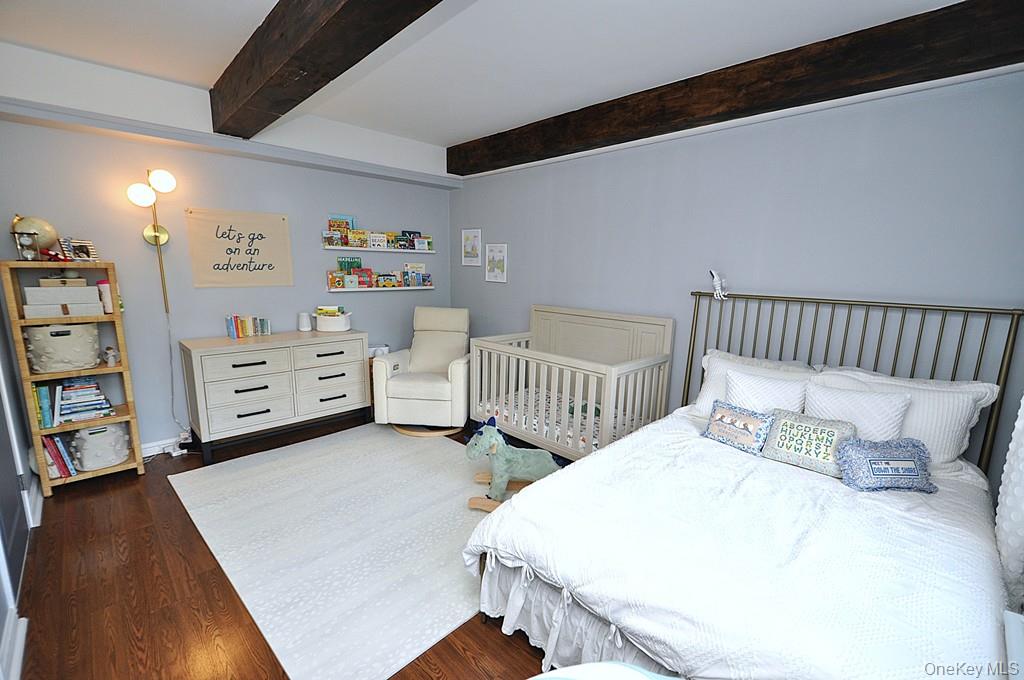 192 Garth Road, Unit TP Scarsdale, NY 10583 - Photo 26 of 43 The private bedroom wing features two spacious bedrooms and two beautifully updated bathrooms, creating a peaceful retreat from the day. Every detail has been carefully curated to deliver comfort, style, and functionality.