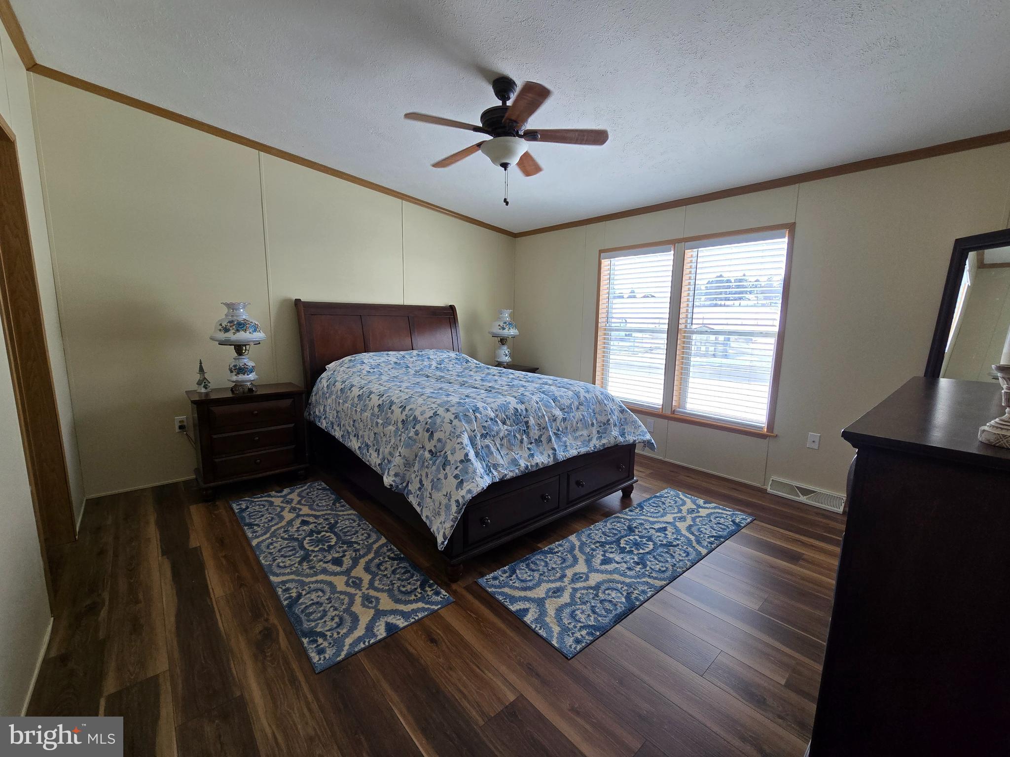 118 Lisa Circle York, PA 17406 - Photo 8 of 12 a bedroom with a bed rug and window