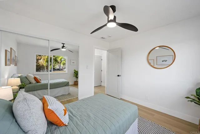 a bedroom with furniture and a bed