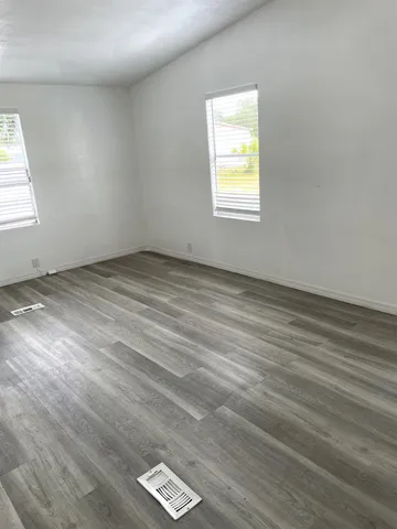 an empty room with windows