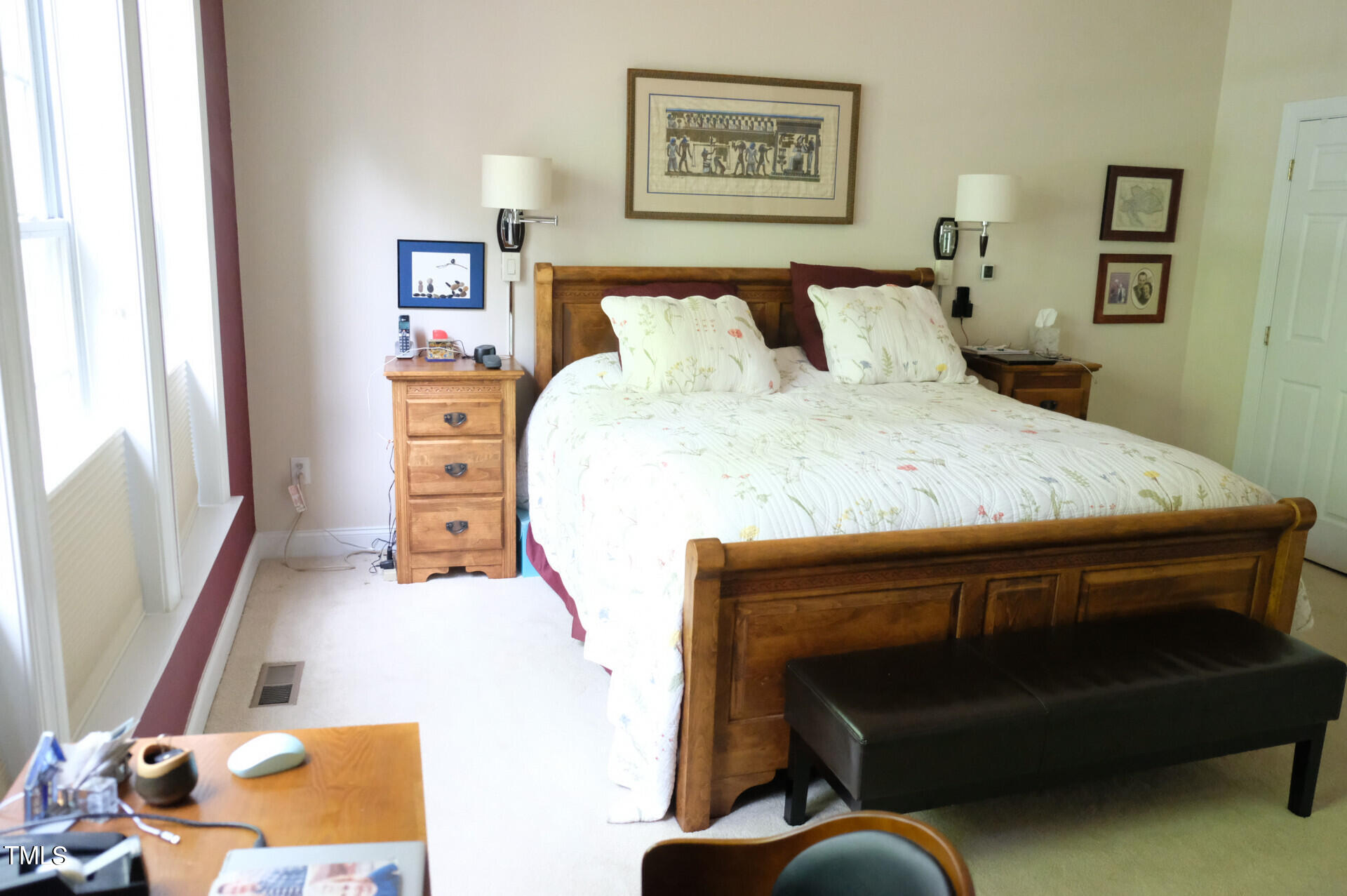 9545 Brookchase Drive Raleigh, NC 27617 - Photo 12 of 46 a bed sitting in a bedroom next to a window