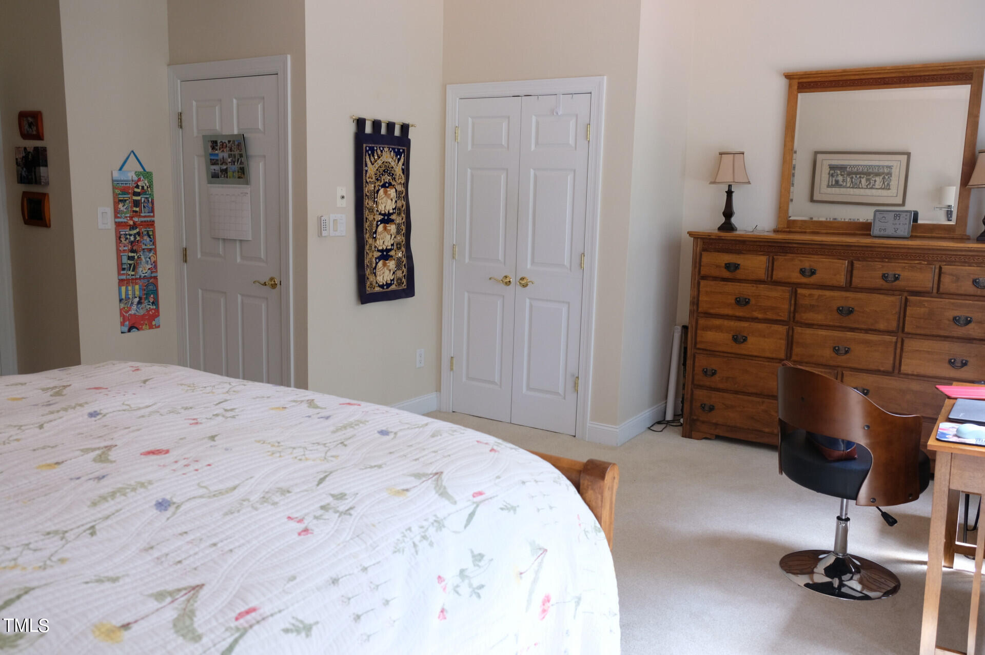 9545 Brookchase Drive Raleigh, NC 27617 - Photo 14 of 46 a bedroom with a bed and a table in it