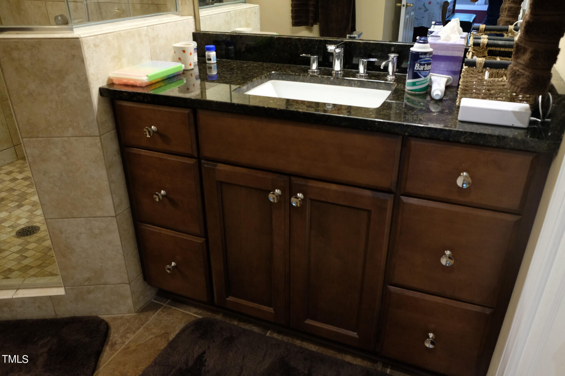9545 Brookchase Drive Raleigh, NC 27617 - Photo 20 of 46 a bathroom with a sink and a mirror