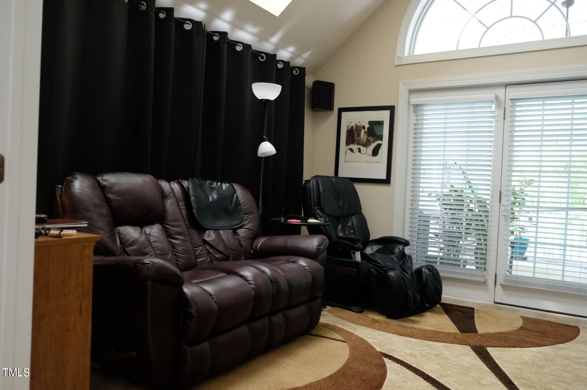 9545 Brookchase Drive Raleigh, NC 27617 - Photo 22 of 46 a living room with furniture and a window