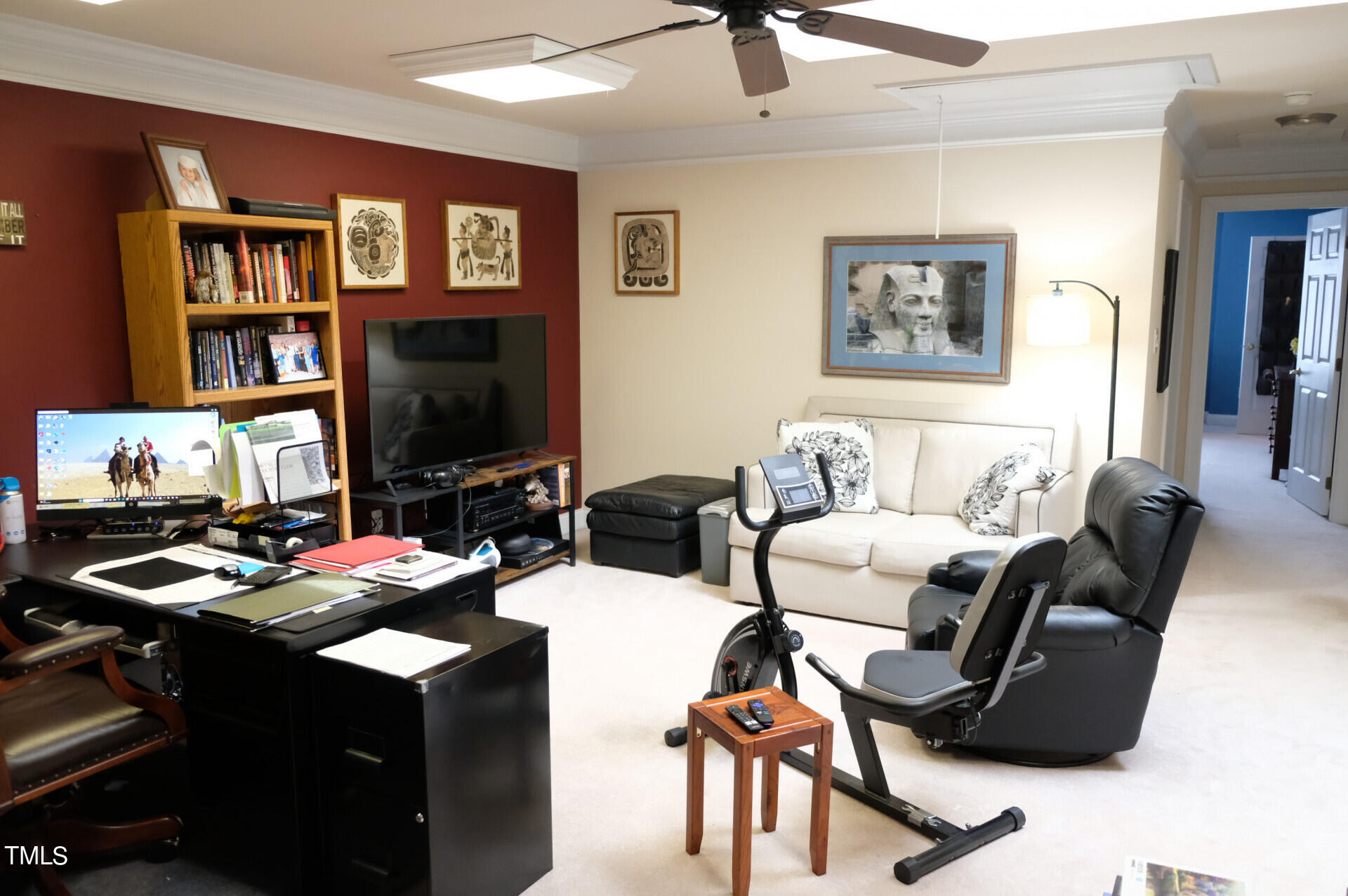 9545 Brookchase Drive Raleigh, NC 27617 - Photo 28 of 46 a living room with furniture and a flat screen tv
