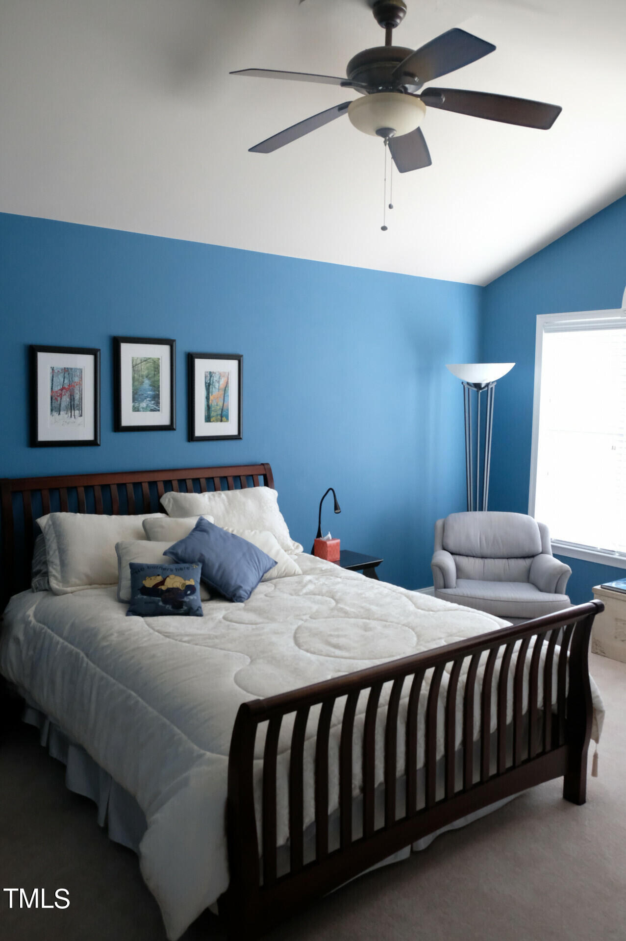 9545 Brookchase Drive Raleigh, NC 27617 - Photo 33 of 46 a bedroom with a bed and window