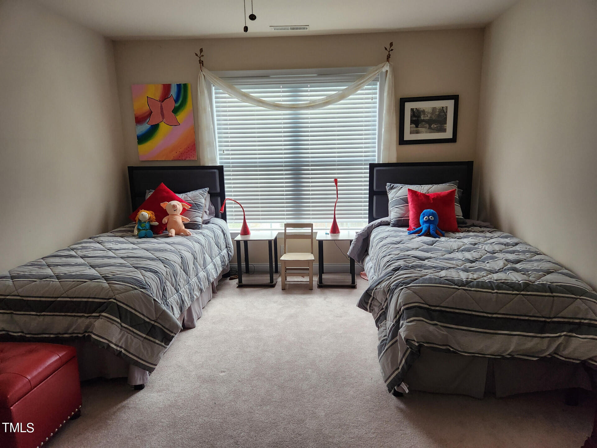 9545 Brookchase Drive Raleigh, NC 27617 - Photo 34 of 46 a bedroom with a bed and window