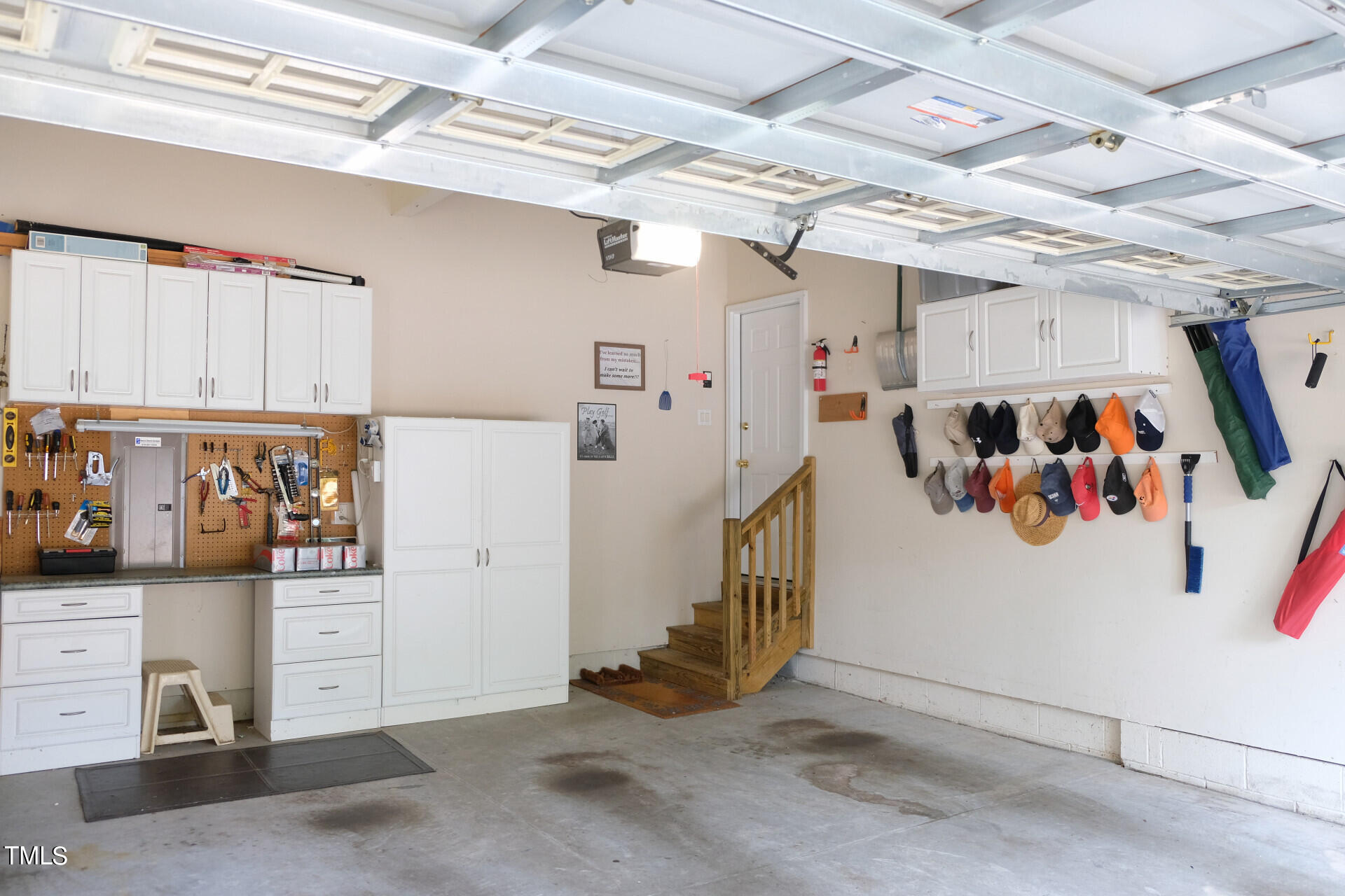 9545 Brookchase Drive Raleigh, NC 27617 - Photo 37 of 46 a view of storage and utility room with lots of appliances