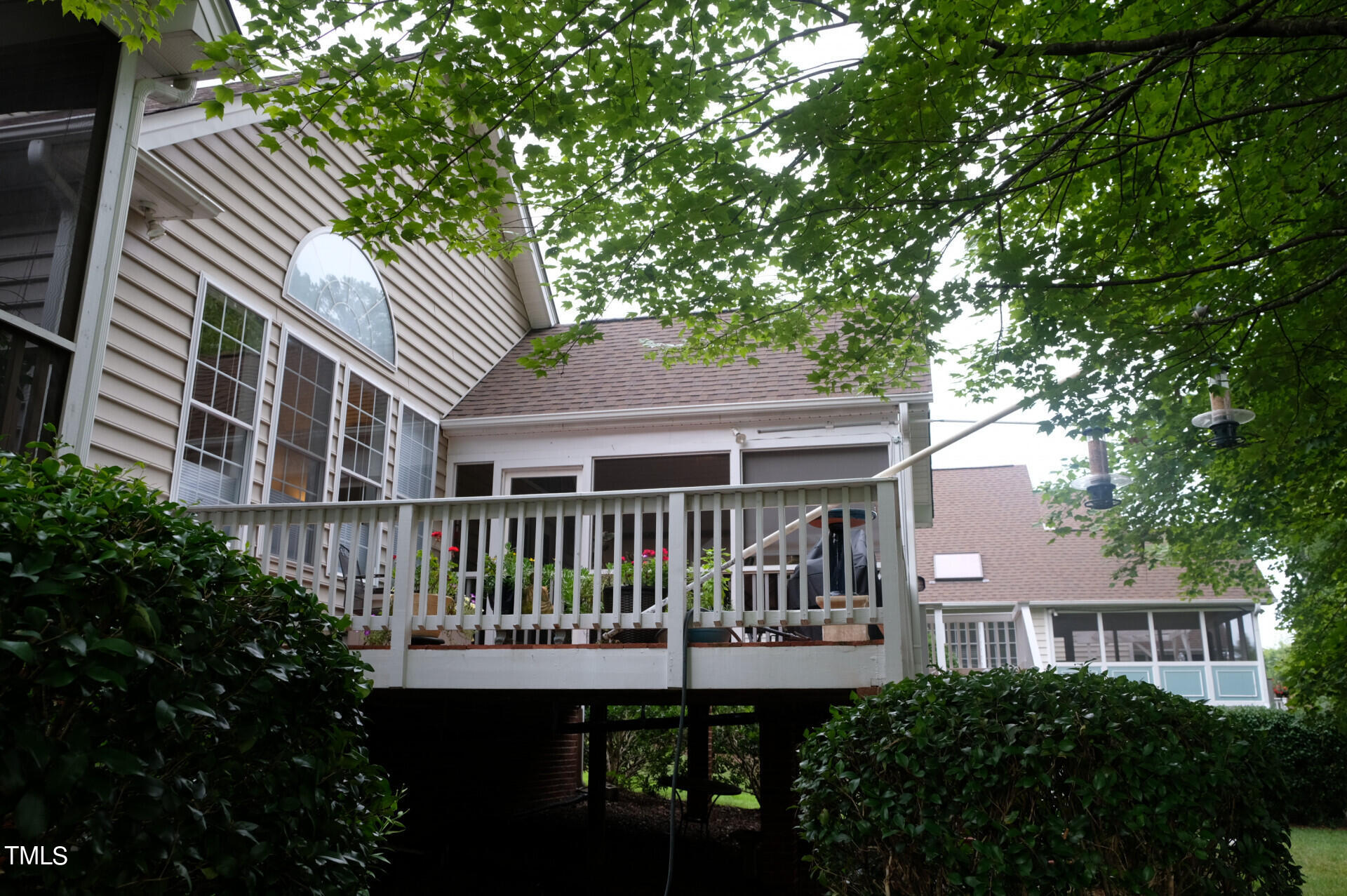9545 Brookchase Drive Raleigh, NC 27617 - Photo 41 of 46 a view of a house with a deck
