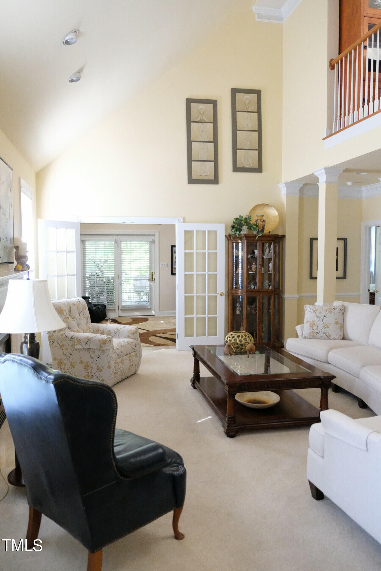 9545 Brookchase Drive Raleigh, NC 27617 - Photo 5 of 46 a living room with furniture and large windows