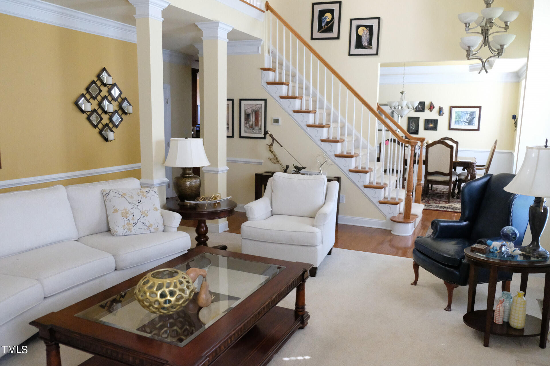 9545 Brookchase Drive Raleigh, NC 27617 - Photo 6 of 46 a living room with furniture and wooden floor