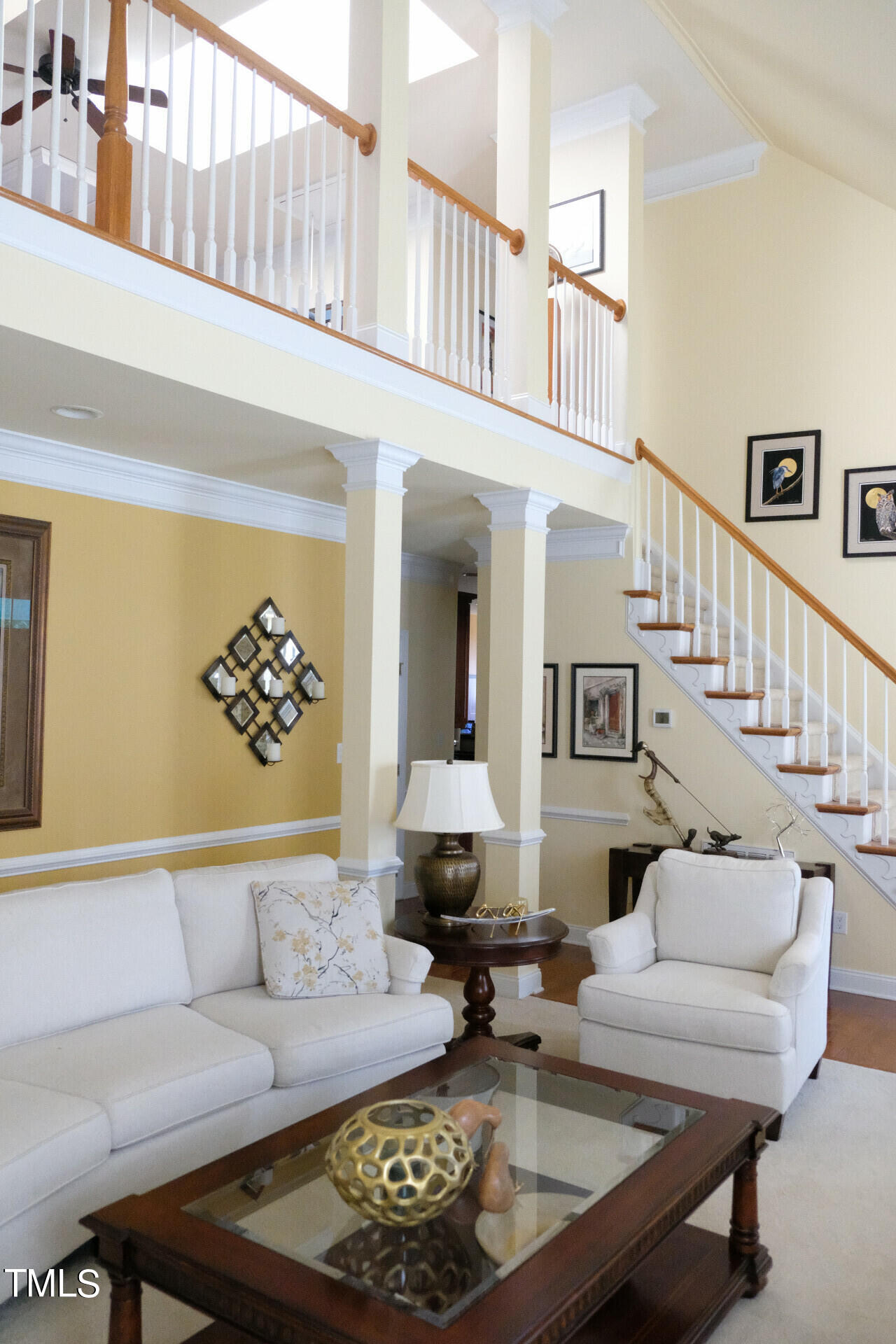 9545 Brookchase Drive Raleigh, NC 27617 - Photo 7 of 46 a living room with furniture and a rug