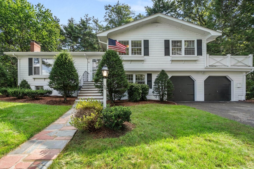 136 Phillips Brooks Road Westwood, MA 02090 - Photo 1 of 8 a view of a yard in front of house