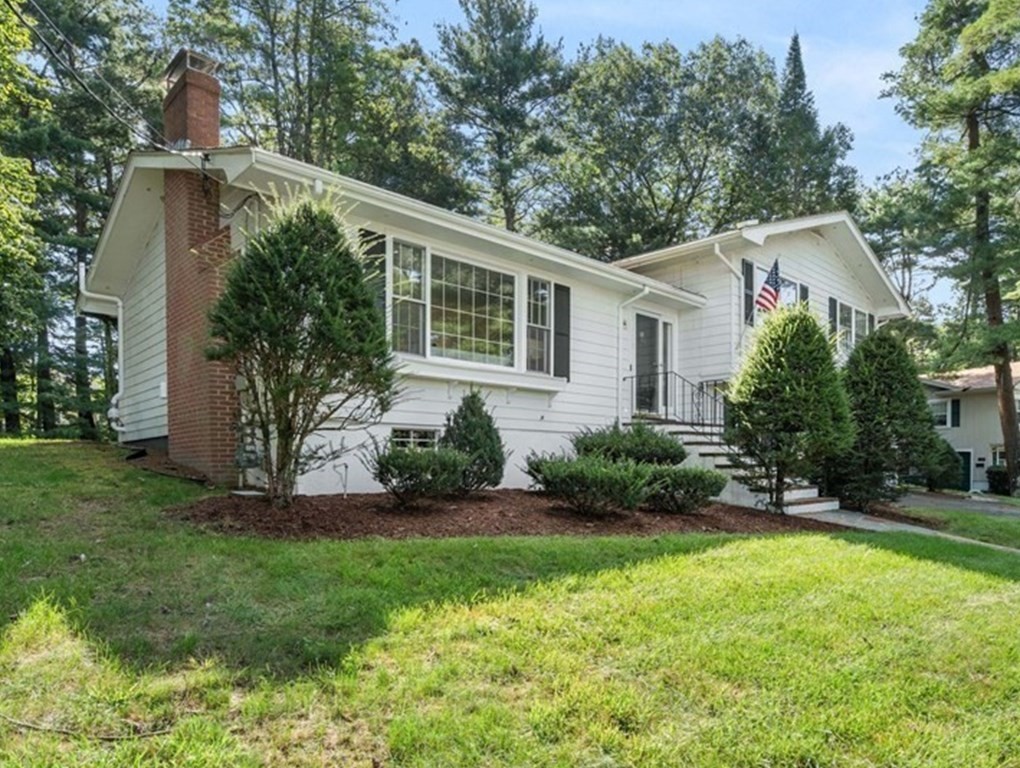 136 Phillips Brooks Road Westwood, MA 02090 - Photo 2 of 8 a front view of house with yard and green space
