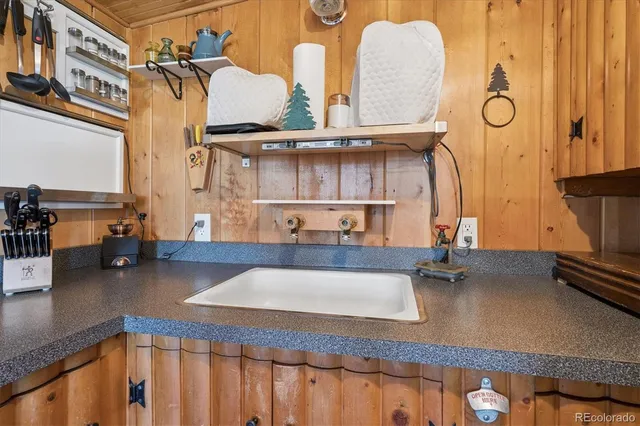 a kitchen with a stove and a table