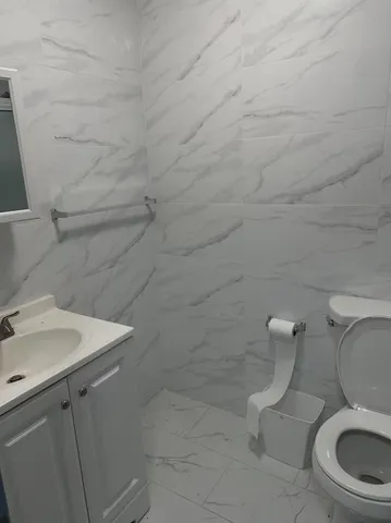 a bathroom with a sink and a toilet