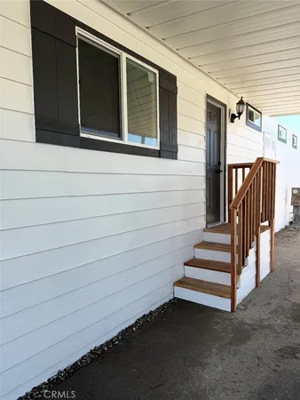 a view of a house with backyard