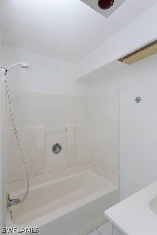 360 Bayland Road Fort Myers Beach, FL 33931 - Photo 14 of 35 a bathroom with a bathtub