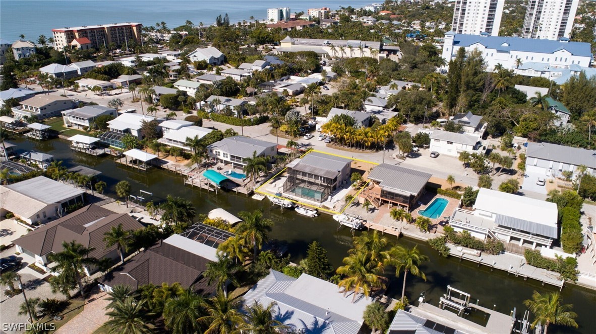 360 Bayland Road Fort Myers Beach, FL 33931 - Photo 30 of 35 an aerial view of a city with lots of residential buildings