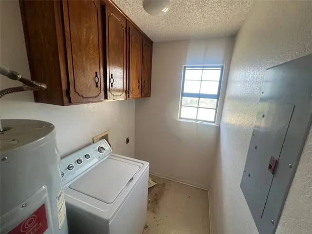 a view of storage and utility room with a sink