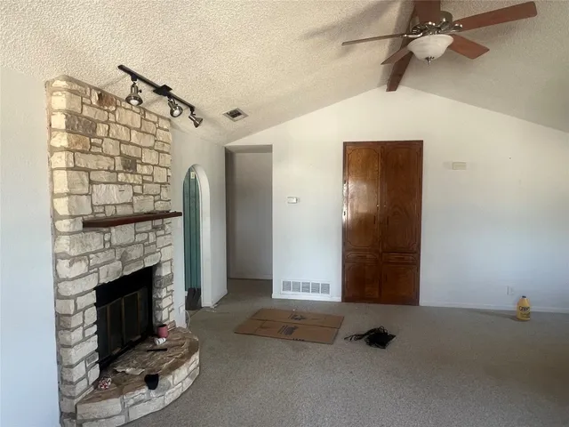 a view of a livingroom with a fireplace