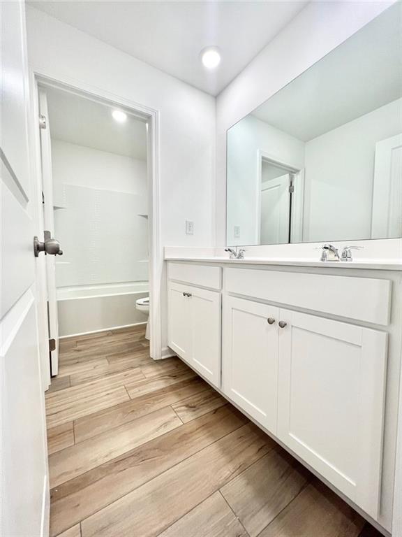 1529 Hay Patch Lane Loganville, GA 30052 - Photo 19 of 24 a bathroom with a sink and a mirror