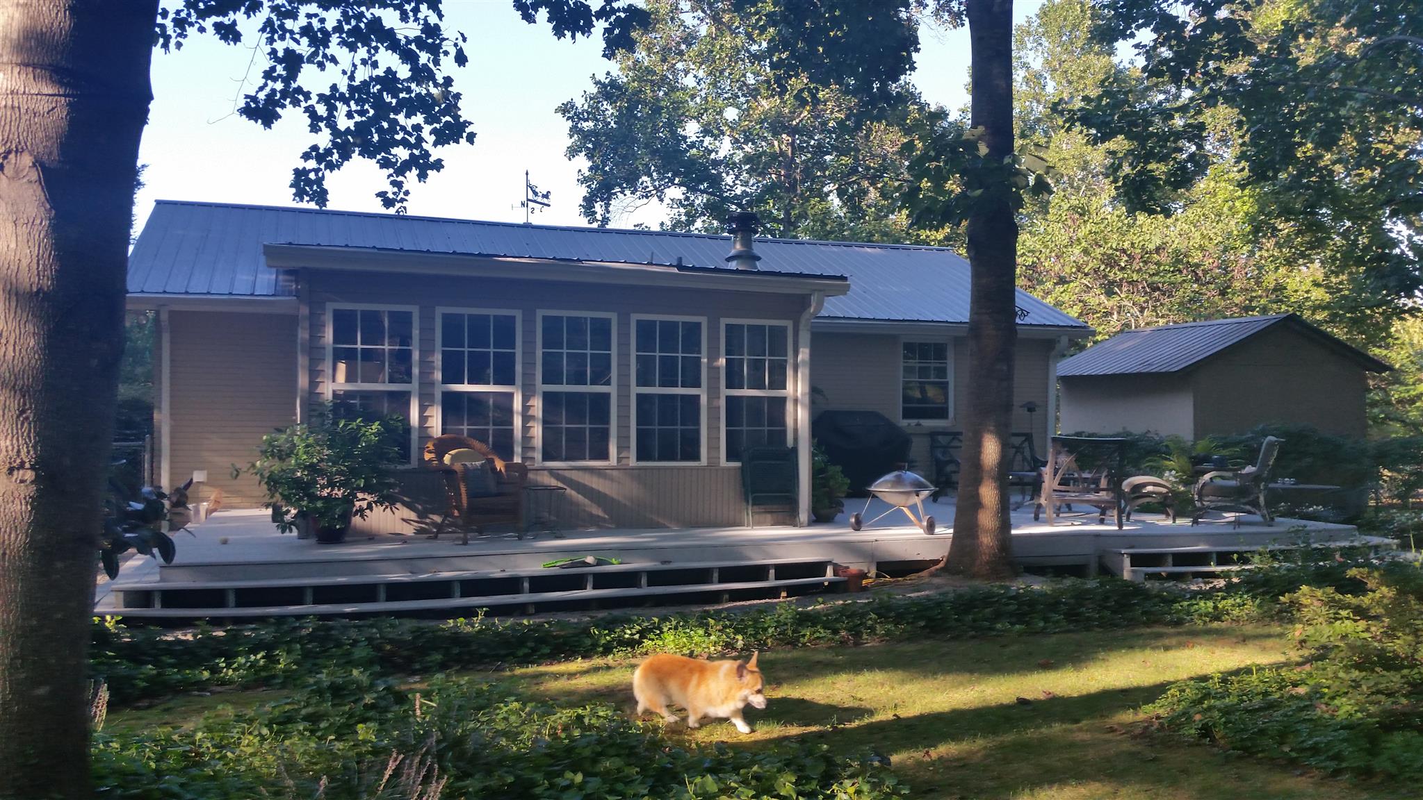 7816 Chester Road Fairview, TN 37062 - Photo 23 of 26 a front view of a house with a garden and swimming pool
