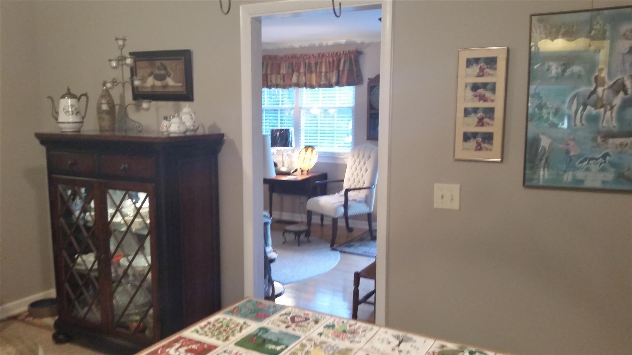 7816 Chester Road Fairview, TN 37062 - Photo 5 of 26 a living room with furniture and a window