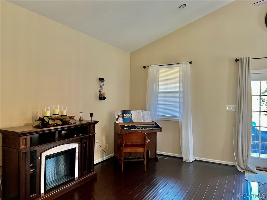 16714 Harrowgate Road Colonial Heights, VA 23834 - Photo 11 of 39 a view of a workspace with furniture and wooden floor