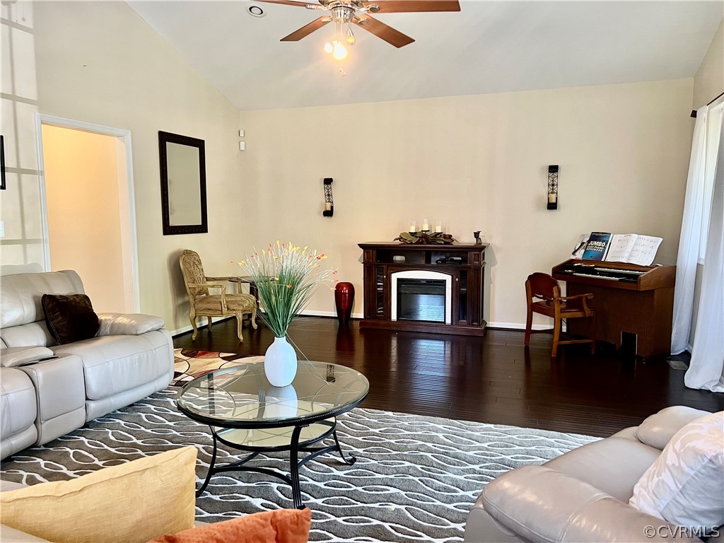 16714 Harrowgate Road Colonial Heights, VA 23834 - Photo 12 of 39 a living room with furniture and wooden floor