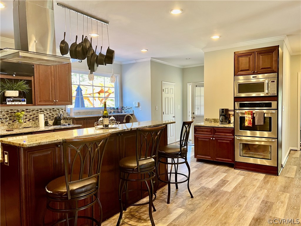 16714 Harrowgate Road Colonial Heights, VA 23834 - Photo 15 of 39 a kitchen with a sink cabinets and window