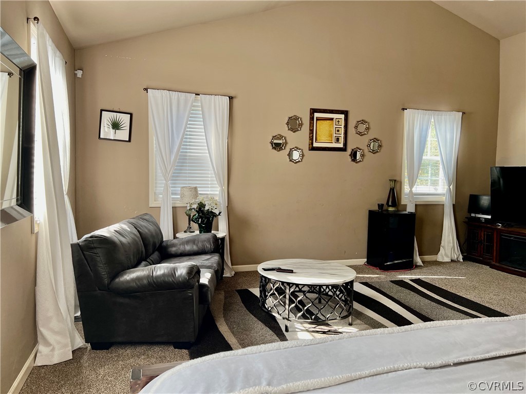 16714 Harrowgate Road Colonial Heights, VA 23834 - Photo 20 of 39 a living room with furniture and a flat screen tv