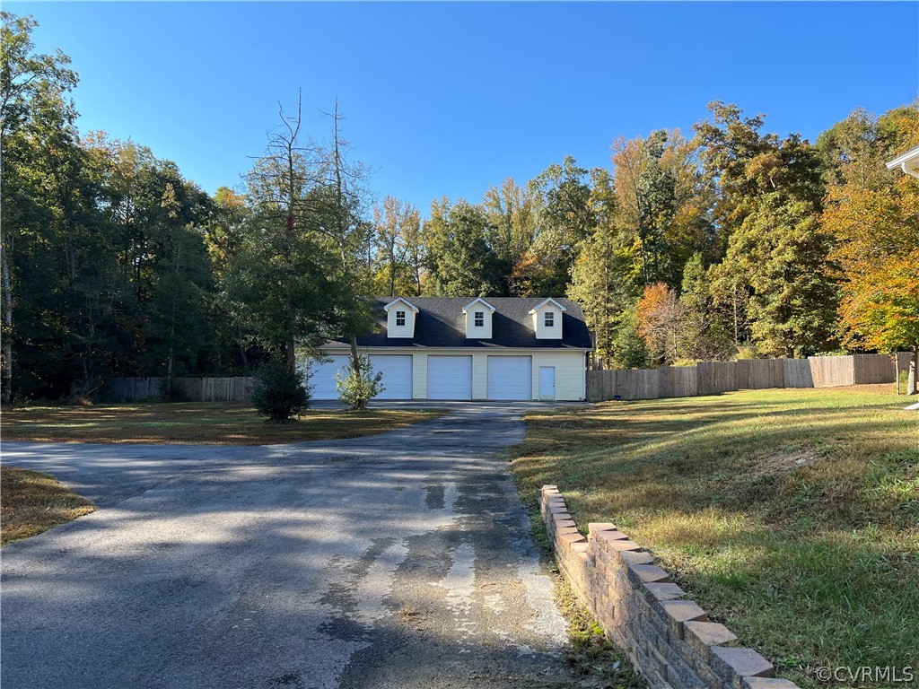 16714 Harrowgate Road Colonial Heights, VA 23834 - Photo 3 of 39 a view of a yard with an outdoor space