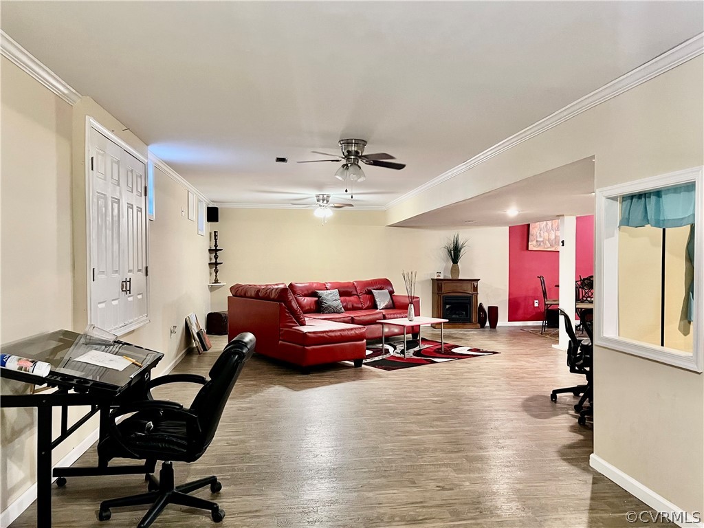 16714 Harrowgate Road Colonial Heights, VA 23834 - Photo 33 of 39 a living room with furniture and a wooden floor