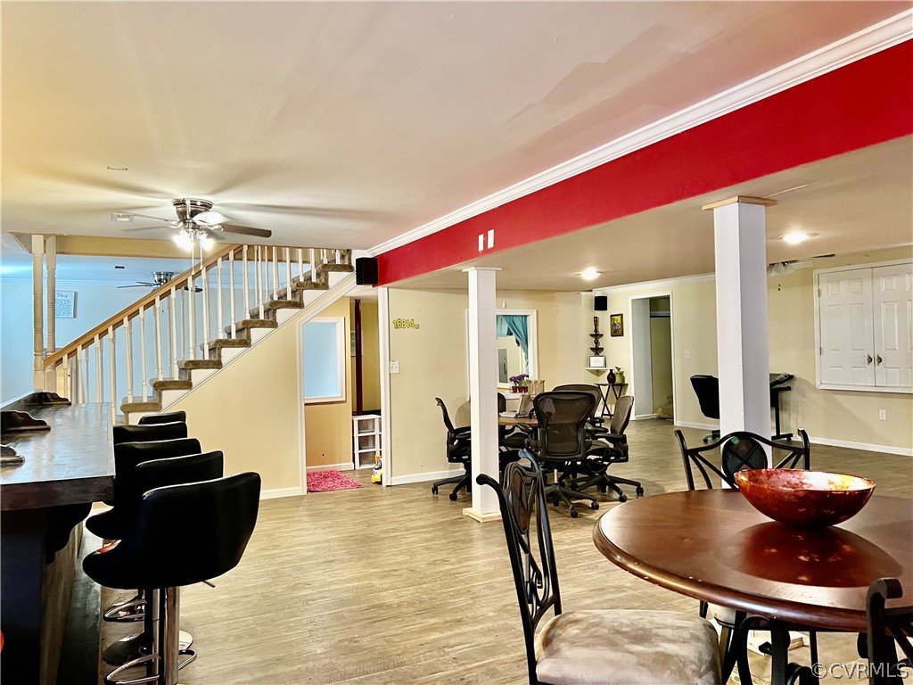 16714 Harrowgate Road Colonial Heights, VA 23834 - Photo 34 of 39 a room with lots of chairs and wooden floor