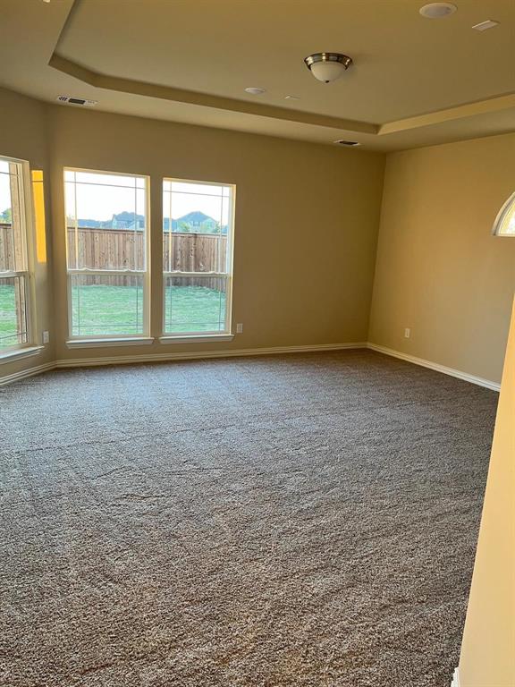 504 Christie Crossing Celina, TX 75009 - Photo 15 of 24 a view of an empty room with a window