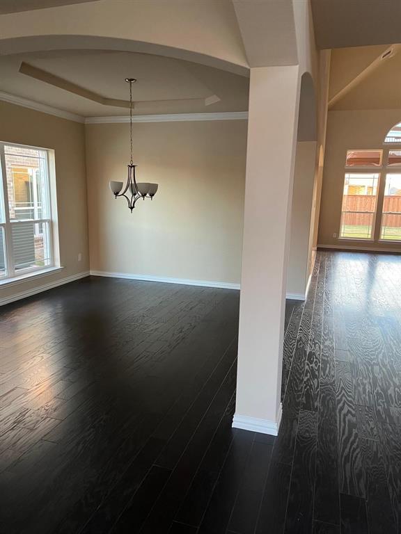 504 Christie Crossing Celina, TX 75009 - Photo 24 of 24 wooden floor in an empty room with a window