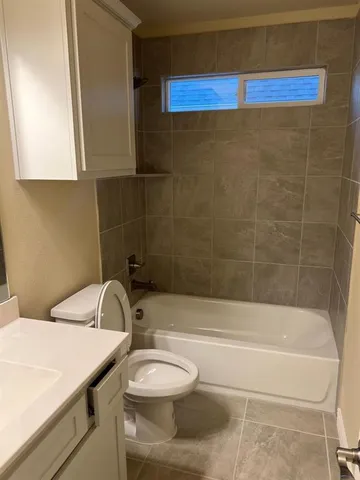 a bathroom with a sink and a bathtub