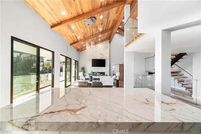 a view of living room with furniture and flat screen tv