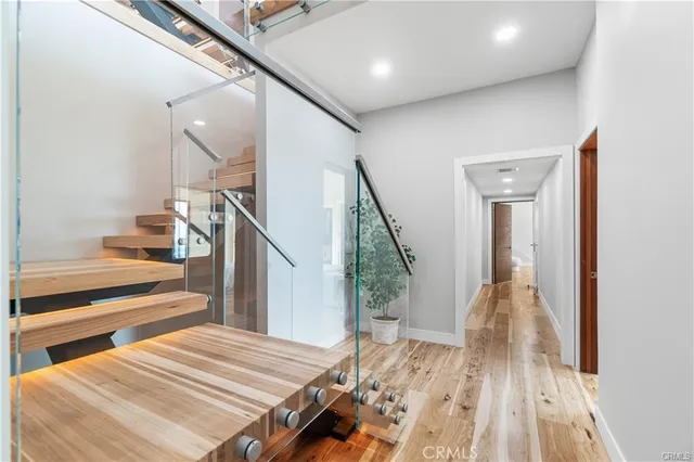 a bedroom with bed and a couch