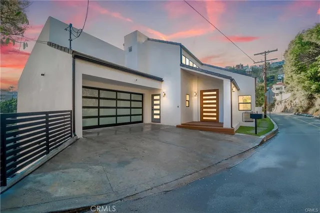 a view of a house with swimming pool