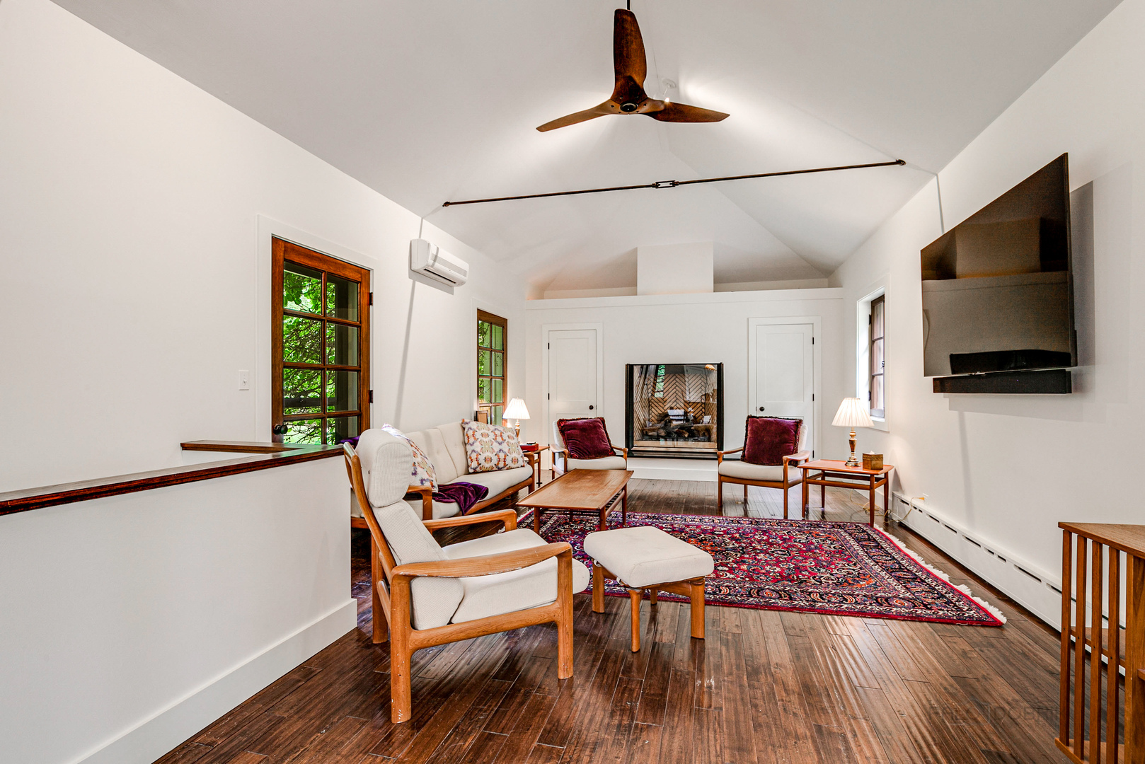 51 South Mayflower Road Lake Forest, IL 60045 - Photo 13 of 85 a living room with furniture and a flat screen tv