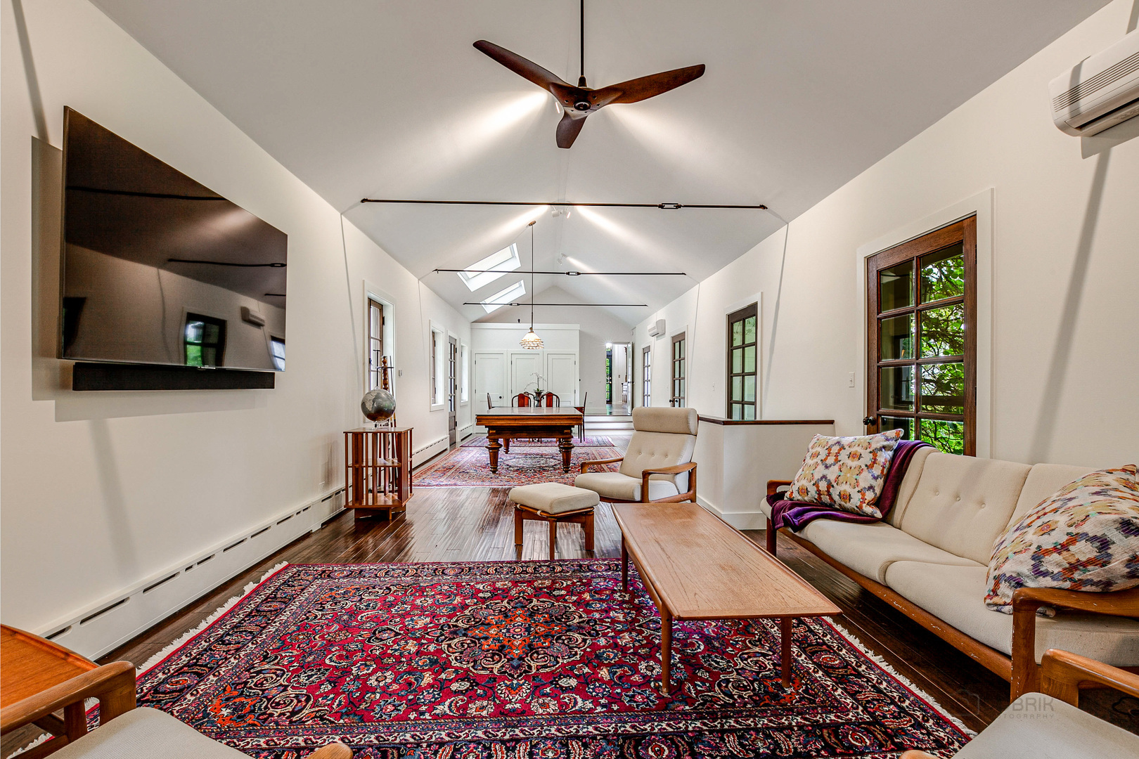 51 South Mayflower Road Lake Forest, IL 60045 - Photo 14 of 85 a living room with furniture and a flat screen tv