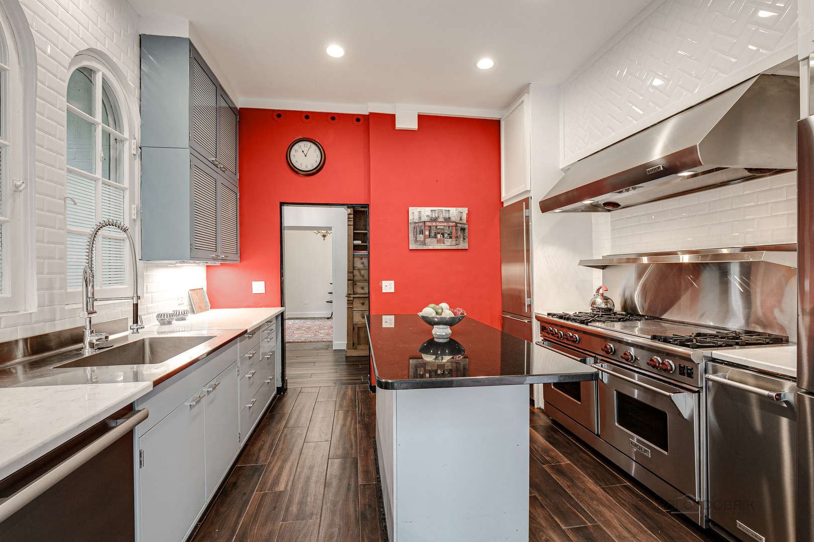 51 South Mayflower Road Lake Forest, IL 60045 - Photo 19 of 85 a kitchen with stainless steel appliances a stove a sink and a refrigerator
