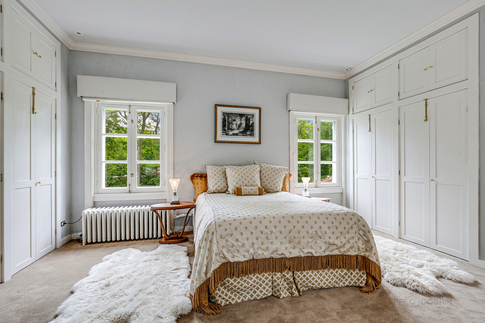 51 South Mayflower Road Lake Forest, IL 60045 - Photo 36 of 85 a bedroom with a bed and a window with outer view